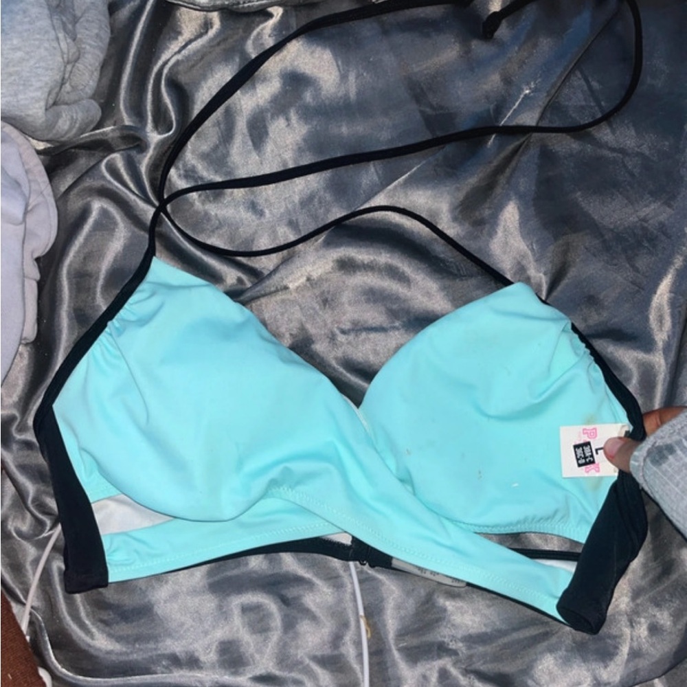 teal and black bathing suit top